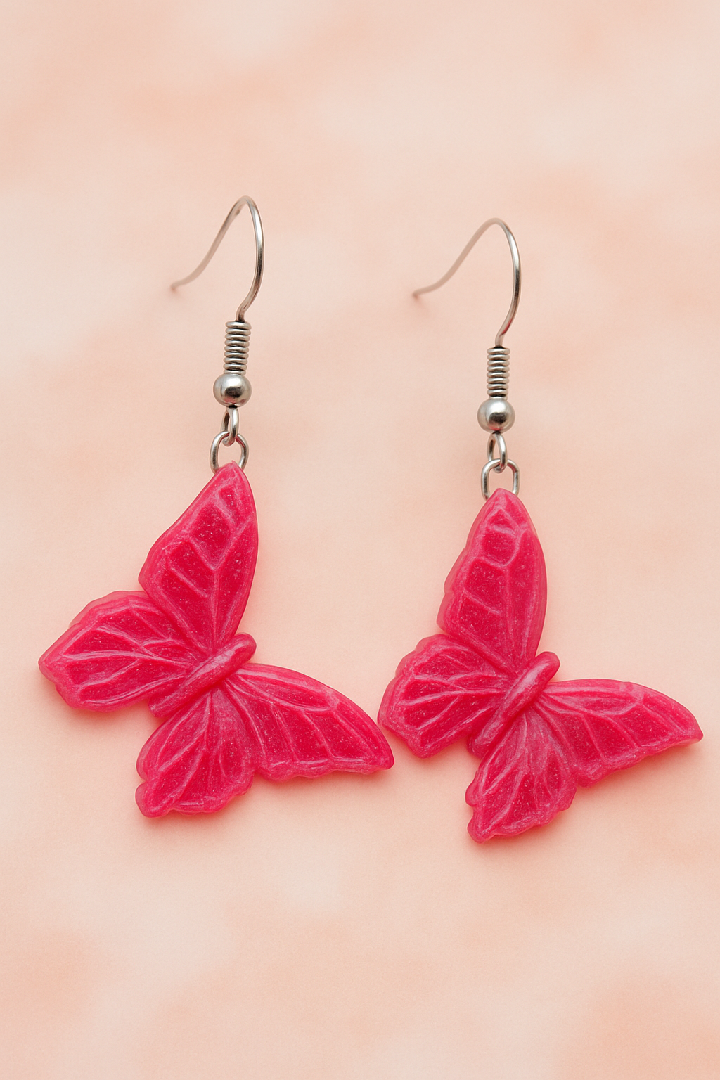 Boucles d'oreilles papillons roses