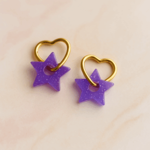 Boucles d'oreilles étoiles entrelacées violettes pailletées